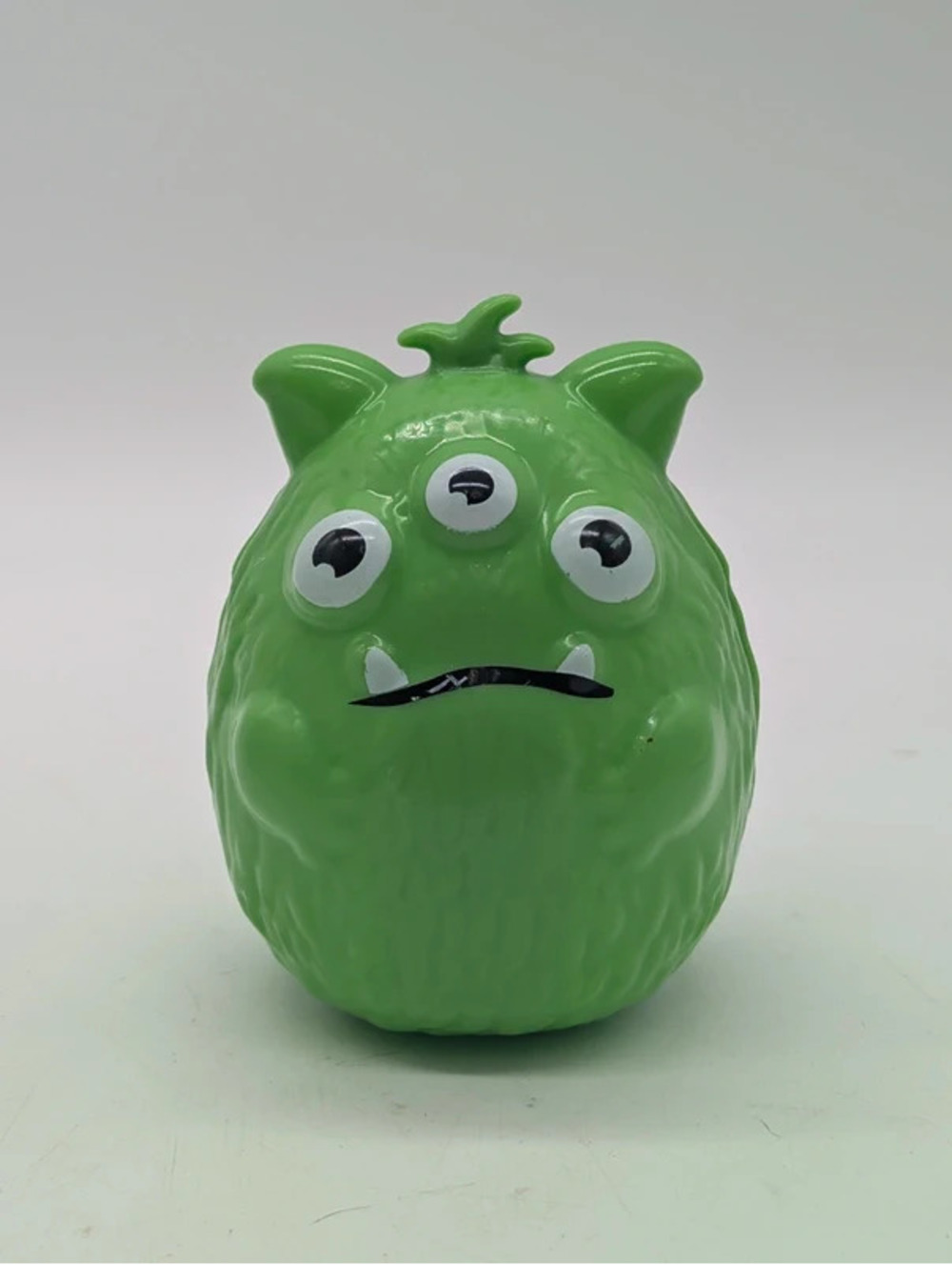 Greenbrier Green 3-Eyed Monster Fillable Plastic Egg Container 4.5"